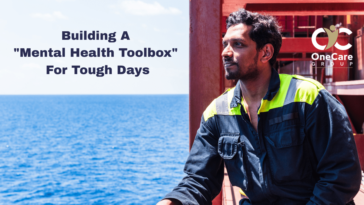 seafarer looking over the horizon at sea, image for article Building A "Mental Health Toolbox" For Tough Days